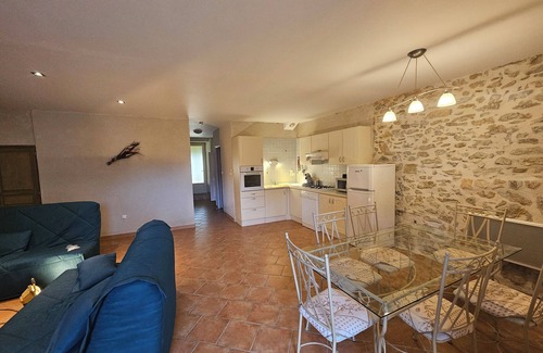Saint-Paulet-de-Caisson Apartment | Country gîte in a stone farmhouse, in the countryside with shared swimming pool