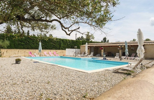 Saint-Paulet-de-Caisson Apartment | Country gîte in a stone farmhouse, in the countryside with shared swimming pool