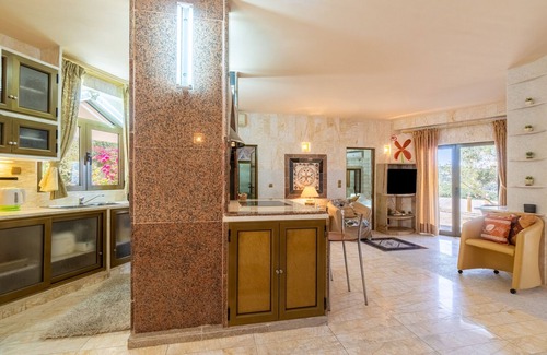 Gaios Villa | Coastal Escape at Paco's Resort with Ocean Views & Amenities