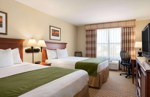 Orange Prairie Hotel | Relax at Country Inn & Suites, Peoria North with Pool Access