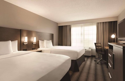 West Newton Hotel | Indulge at Country Inn & Suites, Great Amenities Await!