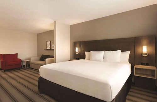 West Newton Hotel | Indulge at Country Inn & Suites, Great Amenities Await!