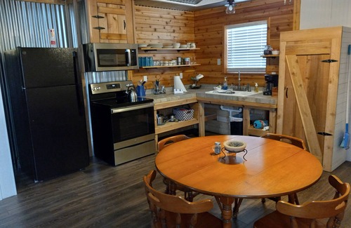 Somerville House | Idyllic Getaway Near Kyle Field with Spa & Hot Tub