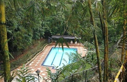 Villavicencio House | Cozy Country Lodging in Aguas Claras with Pool Access