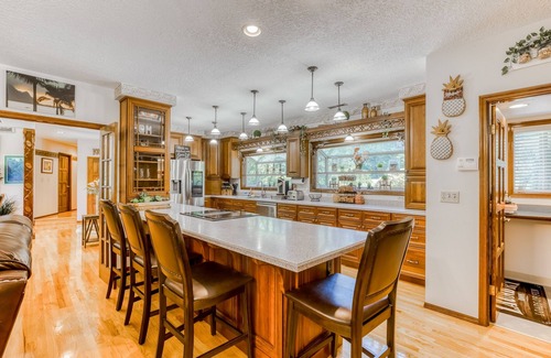 Boring House | Countryside home with private swim spa, fire pit, spacious kitchen, & game room