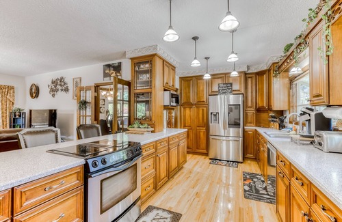 Boring House | Countryside home with private swim spa, fire pit, spacious kitchen, & game room