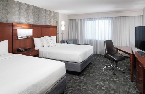 McNeil Hotel | Inviting Courtyard by Marriott Austin with Pool and Spa