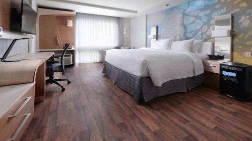 The Colony Hotel | Relaxing Retreat at Courtyard by Marriott Dallas Plano