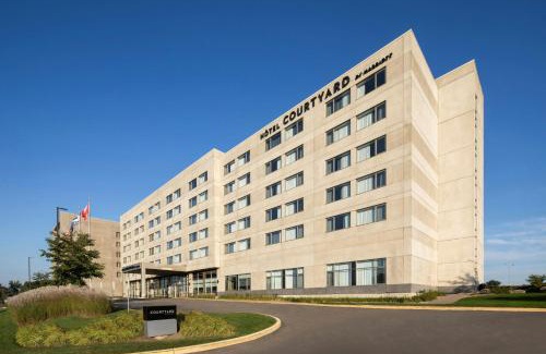 Saint-Laurent Hotel | Comfortable Courtyard by Marriott Montreal Airport Awaits