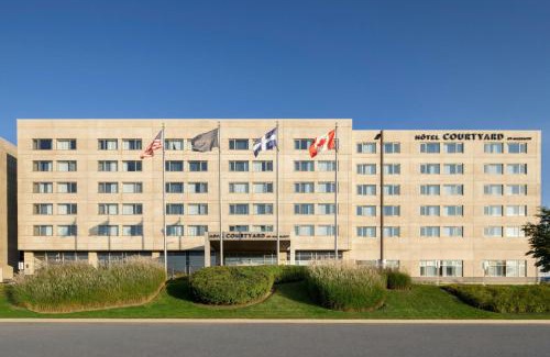 Saint-Laurent Hotel | Comfortable Courtyard by Marriott Montreal Airport Awaits