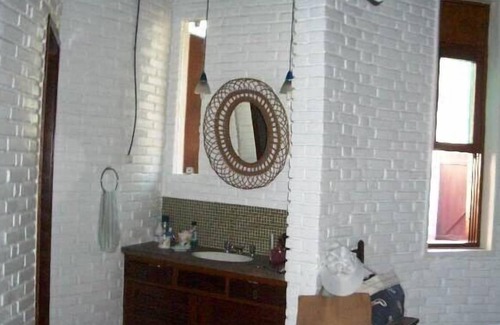 Loteamento Joao Batista Juliao House | Prime Oceanfront Cove with Pool & Suites, Steps from Beach