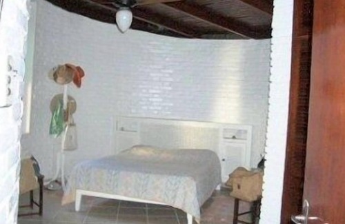 Loteamento Joao Batista Juliao House | Prime Oceanfront Cove with Pool & Suites, Steps from Beach