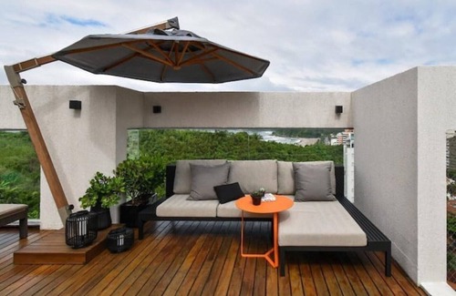 Tombo Apartment | Relax by the Heated Pool with Beach Service Awaits You