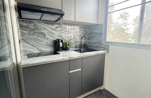 Ratchadaphisek Apartment | Inviting 1BD Retreat in Central Rama 9 with Free Wifi