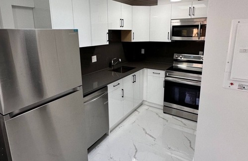 Delta House | Cozy 2-bedroom guest suite available for your vacation.
