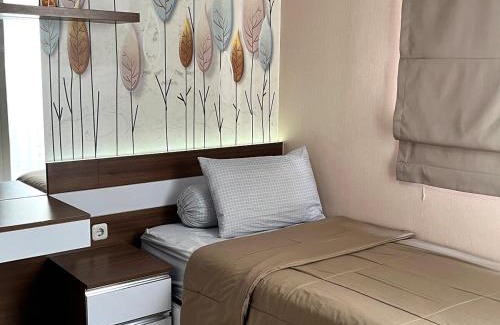 Bandung Kulon Apartment | Inviting 2 BR Sudirman Suites with Pool & Child-Friendly Space