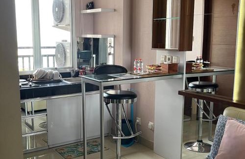 Bandung Kulon Apartment | Inviting 2 BR Sudirman Suites with Pool & Child-Friendly Space