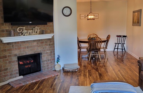 Buechel Condo | Inviting 2-Story Townhouse with Playroom & Putting Green