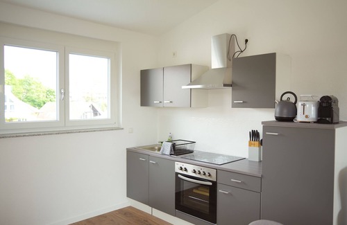 Lahr House | Inviting 2-Bedroom Retreat with Balcony and Scenic Views
