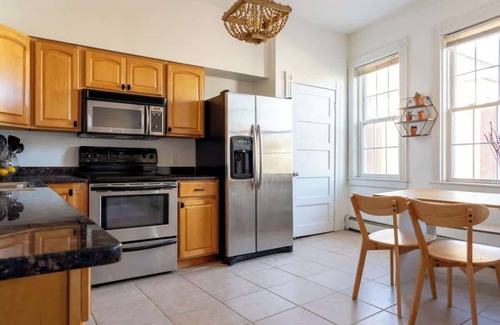 Off Broadway Apartment | Corner Cafe: Pet-Friendly Retreat with Spa and Breakfast