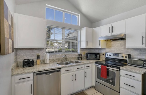 Oviedo House | Relaxing Lakefront Retreat with Hot Tub & Game Room