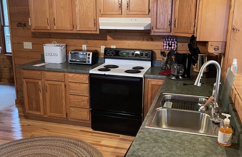 Tuckasegee House | Inviting Retreat with Porch Swing & Pet-Friendly Amenities