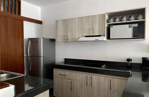 Merida Municipality Apartment | Inviting Apartment with Pool and Ocean Views in Merida