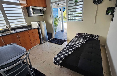 Puerto Nuevo Apartment | Modern Black & White Apartment with Hot Tub and Terrace