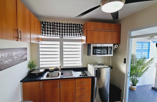 Puerto Nuevo Apartment | Modern Black & White Apartment with Hot Tub and Terrace
