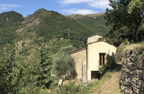 Carpasio Cottage | Charming Stone House with Terrace in Serene Mountain Setting