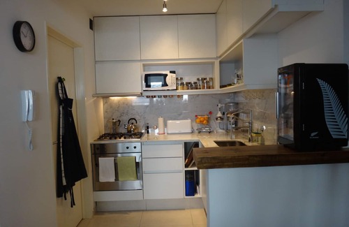 Nunez Apartment | Chic Studio Retreat for Two with Spa and Breakfast Included