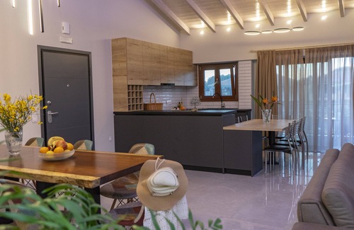 Nidri Apartment | Welcoming Apartment Steps from Nidri Beach with Pool