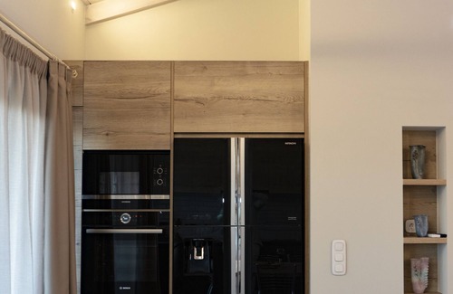 Nidri Apartment | Welcoming Apartment Steps from Nidri Beach with Pool