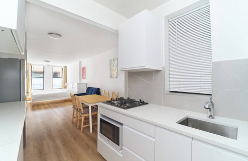East Harlem Apartment | Inviting Upper East Side Apartment with Spa & Kitchen Access