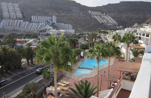 Mogan Apartment | Seaside Haven: Cozy Apartment with Pool at Jardin Paraiso