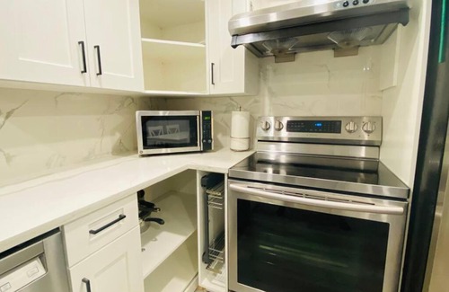 Canyon Meadows Apartment | Charming 2BR Basement Retreat with Kitchen for Families