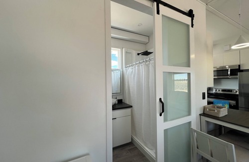 Beryl Junction House | Cozy Beach House tiny home in tranquil Beryl Utah with AC, WiFi, fitness room.