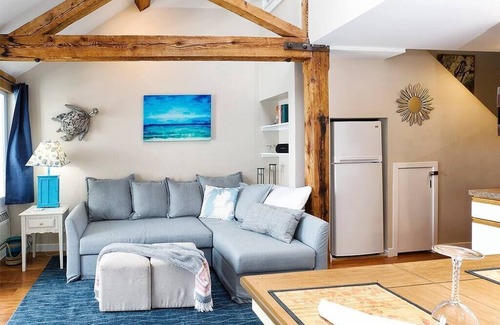 Charlevoix Condo | Inviting Boat House II on Lake Charlevoix with Pool Access