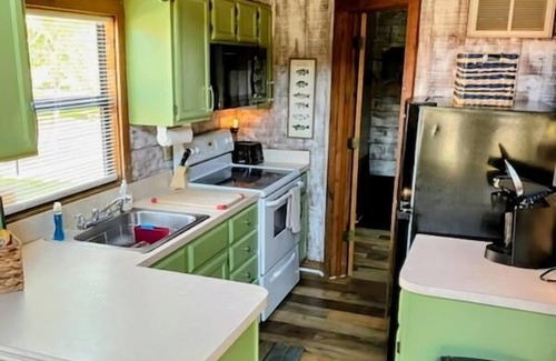 Okeechobee Cabin | Inviting Lake Log Cabin with Pool on Beautiful Okeechobee