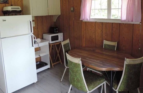 Puposky Cabin | Charming Cabin Retreat by Scenic Fishing Lake in MN