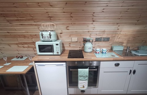 Spittal Cabin | Explore Achmeney Glamping Pod: Perfect for Families & Pets!