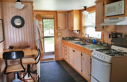 Levering Cottage | Charming Cabin with Breathtaking Sunsets and Lake Views