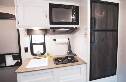 Midtown House | Unique Midtown Houston Camper with Kitchen and Tesla Rental