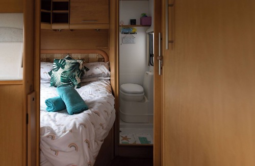 West Buckland RV Rental | Charming Caravan Escape for Two with Pool & Breakfast
