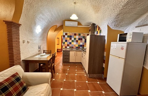 Benalua de Guadix Apartment | Charming Cave Studio with Terrace and Spa Amenities