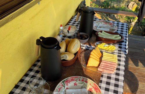 Interior de Sao Paulo Ski Chalet | Cozy chalet in Eldorado with AC and WiFi for a relaxing stay