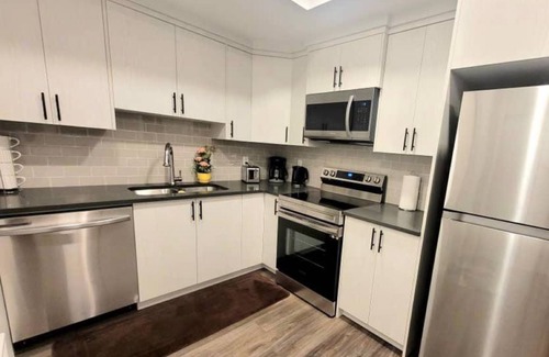 Southeast Calgary House | Inviting 2-Bedroom Retreat with Free Parking & Breakfast