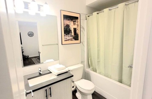 Southeast Calgary House | Inviting 2-Bedroom Retreat with Free Parking & Breakfast