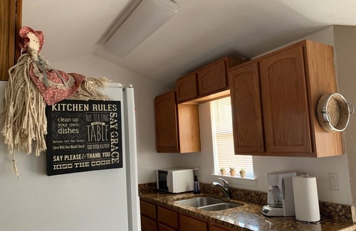 Biggs Field House | Inviting Duplex with Refrigerated Air & Spa Amenities