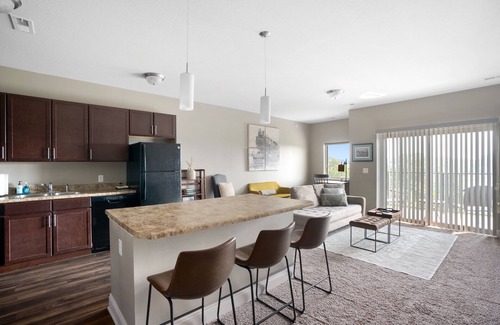 West Des Moines Apartment | Inviting Balcony Retreat with Pool and Pet-Friendly Perks